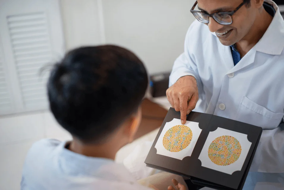 doctor testing color vision of a child